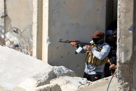 Scontri fra milizie sciite a Baghdad © EPA