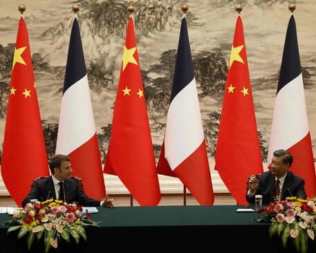 Il presidente francese Macron e quello cinese Xi © AFP