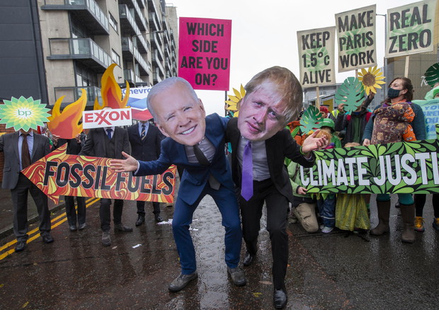 Una manifestazione di attivisti a Glasgow© EPA>