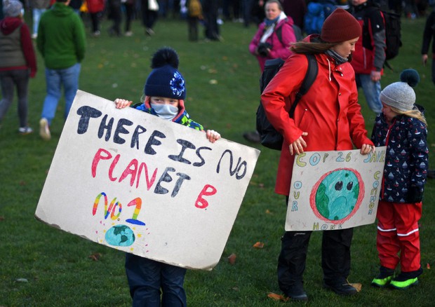 Attivisti a Glasgow© AFP>