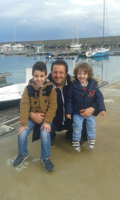 I miei figli Nicola Pio e Rocco Karol - Francesco Lacopo a Roccella Jonica (foto: ANSA)