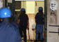 Poliziotti all'ingresso della scuola Diaz di Genova in una foto d'archivio © ANSA