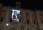 A Roma la foto di Proietti illumina il Campidoglio e i monumenti © ANSA