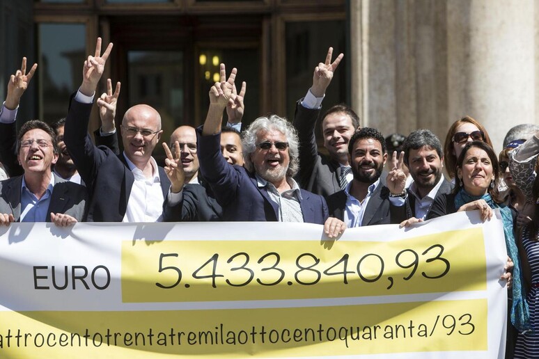 Il Restitution Day con Beppe Grillo, foto d 'archivio - RIPRODUZIONE RISERVATA