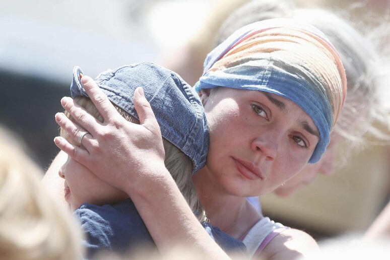 Negli occhi di una mamma che protegge il figlio, il dramma Ucraina © ANSA/EPA