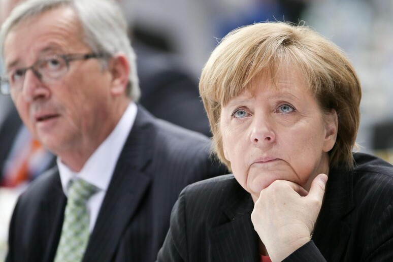 Angela Merkel e Jean-Claude Juncker © ANSA/EPA