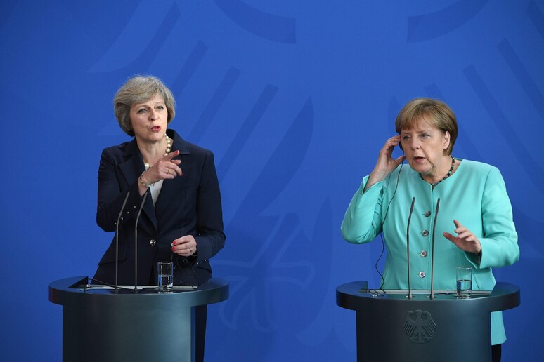 Theresa May e Angela Merkel - RIPRODUZIONE RISERVATA