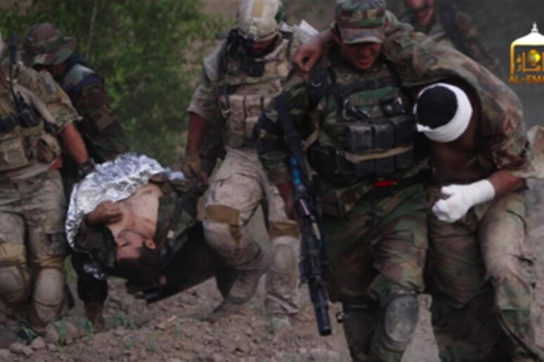 Video still with wounded American troops taken from suspects ' cell phones -     ALL RIGHTS RESERVED