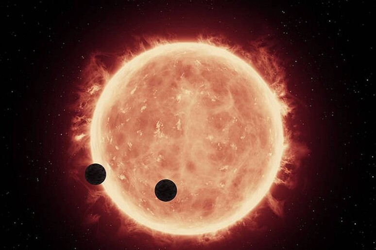 Rappresentazione artistica dei due pianeti rocciosi simili alla Terra, la cuia tmosfera è stata osservata grazie al telescopio spaziale Hubble (fonte: NASA/ESA/STScI/J. de Wit, MIT) - RIPRODUZIONE RISERVATA