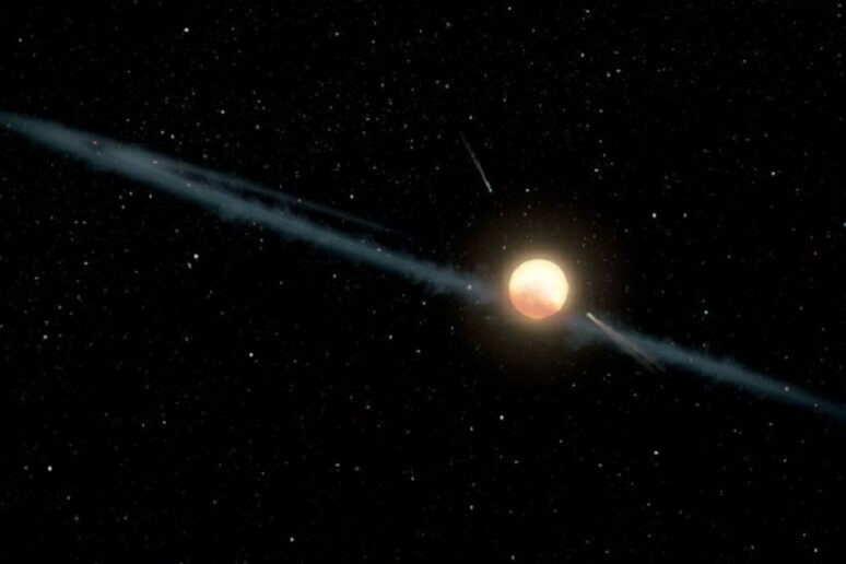 Rappresentazione artistica della stella  KIC 8462852, diventata popolare come Tabby 's Star, circondata da un disco irregolare di materia (fonte: NASA/JPL-Caltech) - RIPRODUZIONE RISERVATA