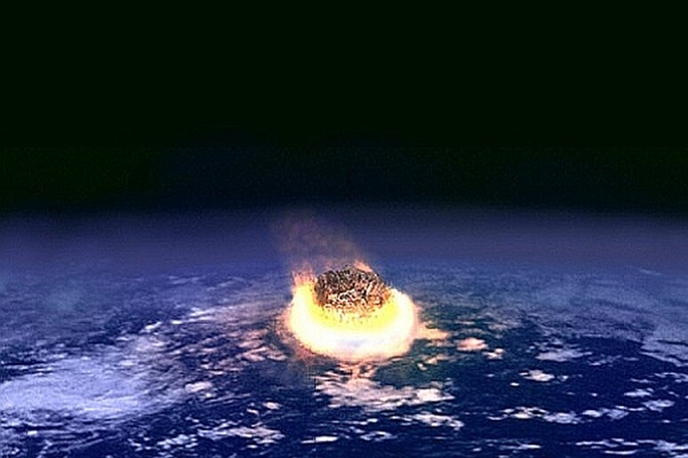 Rappresentazione artistica dell 'impatto catastrofico di un asteroide - RIPRODUZIONE RISERVATA