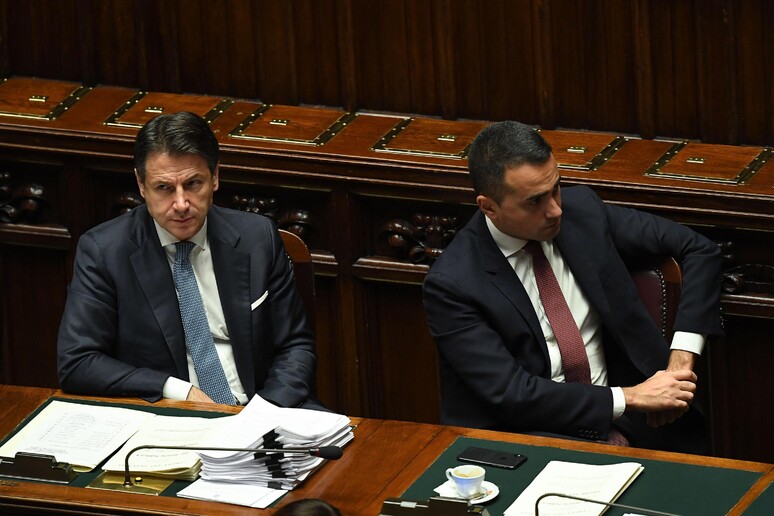 L 	'ex premier, Giuseppe Conte, e il ministro Di Maio - RIPRODUZIONE RISERVATA