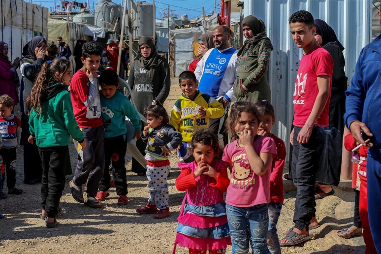 Rifugiati siriani in Libano © ANSA/EPA