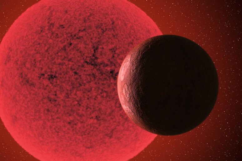 Rappresentazione artistica di una super-Terra in orbita intorno a una nana rossa (fonte: Gabriel Pérez Díaz, SMM/IAC) - RIPRODUZIONE RISERVATA