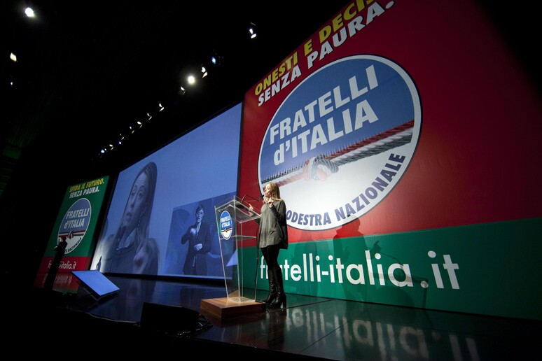 Giorgia Meloni durante una convention di Fratelli d 'Italia - RIPRODUZIONE RISERVATA