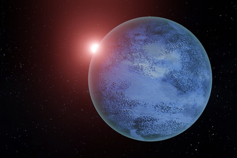 Rappresentazione artistica di un pianeta ghiacciato con un oceano di acqua liquida sotto la superficie (fonte: Lujendra Ojha) - RIPRODUZIONE RISERVATA