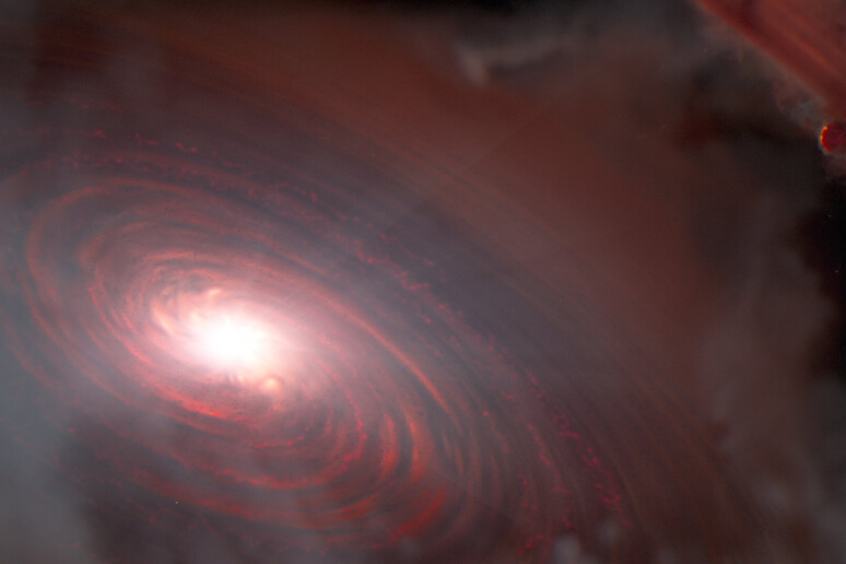 Rappresentazione artistica della stella Pds 70, circondata da un disco di gas e polveri nel quale stano nascendo pianeti (fonte: NASA, ESA, CSA, J. Olmsted/STScI) - RIPRODUZIONE RISERVATA
